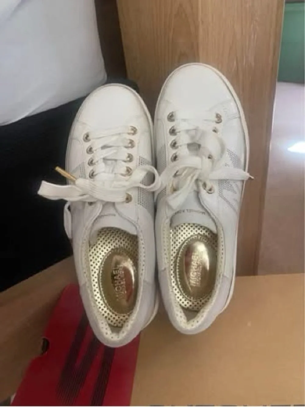 Women’s size 7 Michael Kors Sneakers with Gold Trim